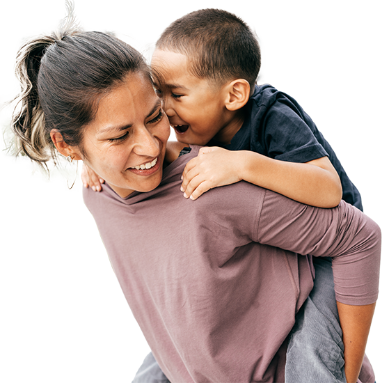 1-6-3-1-ChildHealthPlus Child laughing while on adults back