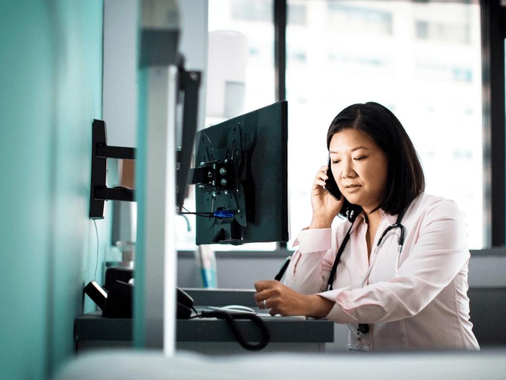 provider on phone at desk