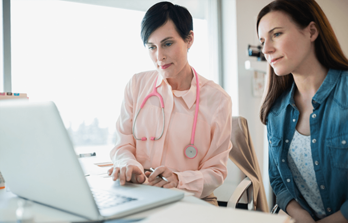 doctor and patient at laptop