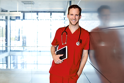 doctor leaning on wall